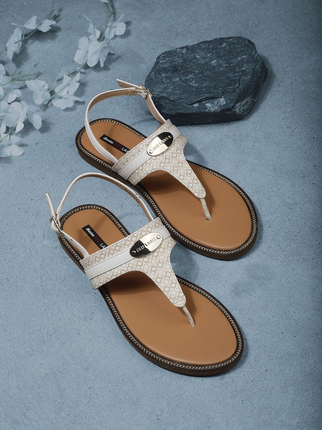 

Bata Women Printed T-Strap Flats, Beige