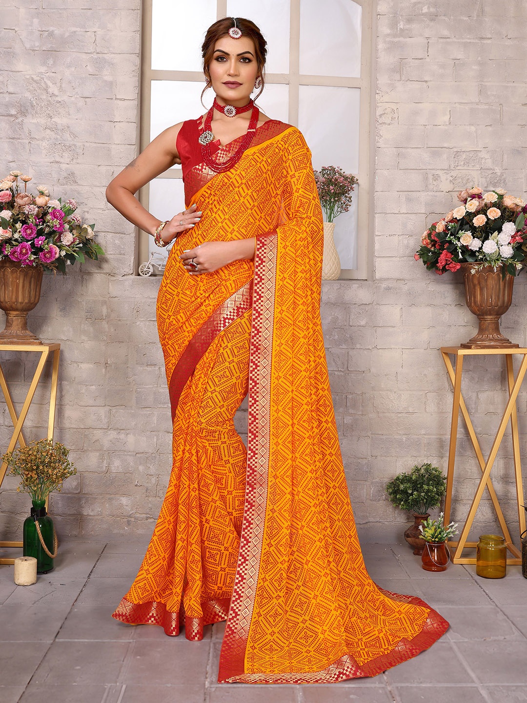 

KALINI Ethnic Motifs Printed Zari Fusion Bandhani Saree, Yellow