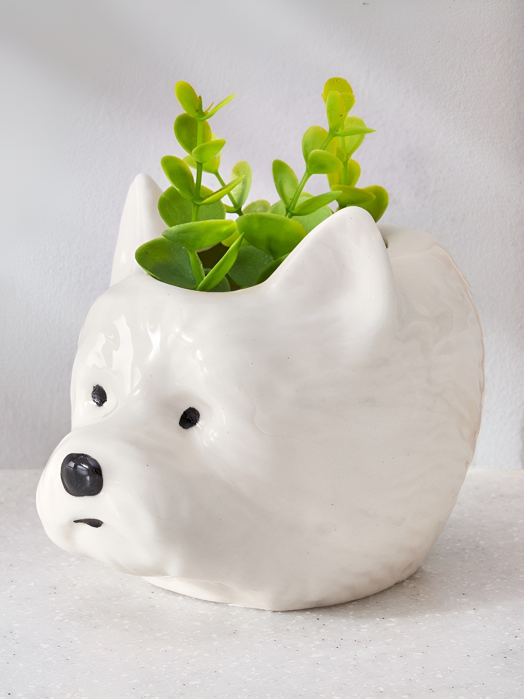 

Home Centre Corsica Eden White Ceramic Wolf Planter