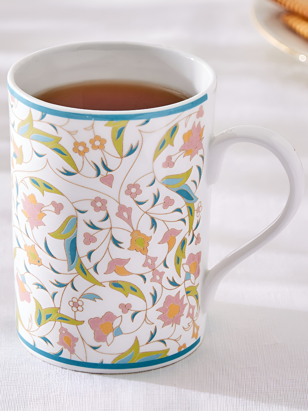 

Home Centre White & Blue Printed Bone China Matte Mugs Set of Cups and Mugs