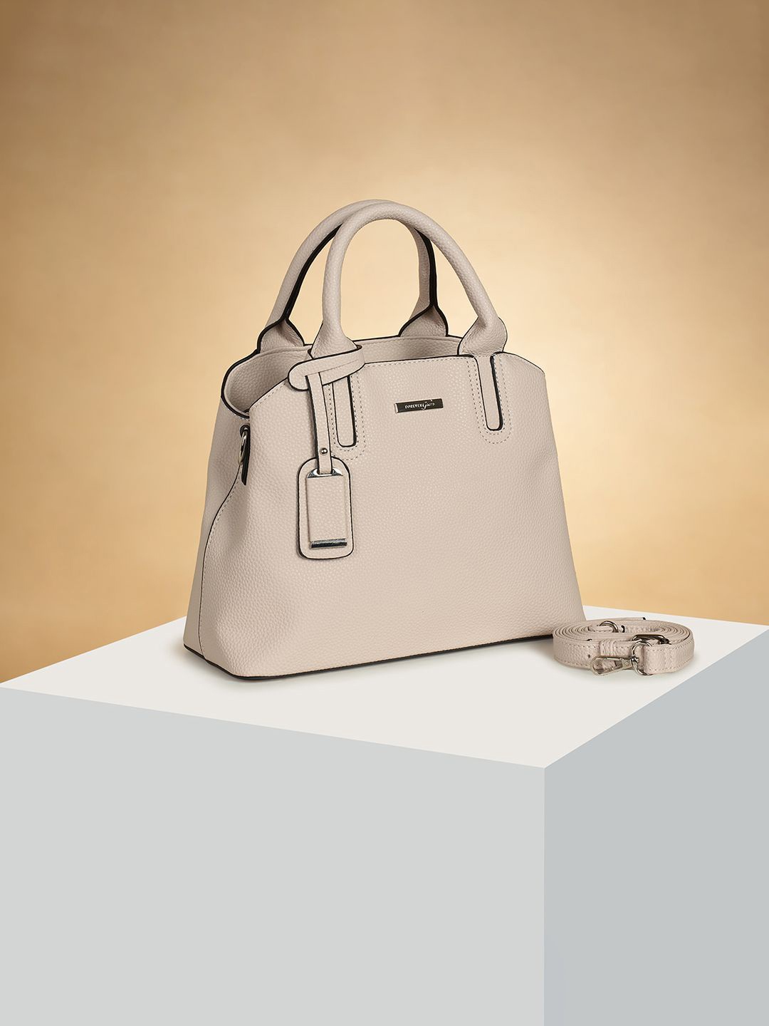 

Forever Glam by Pantaloons Women Solid Structured Handheld Bag, Beige