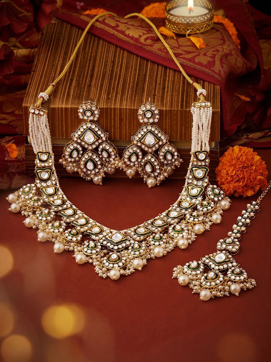 

Zaveri Pearls Gold-Plated Meenakari Kundan-Studded & Beaded Jewellery Set