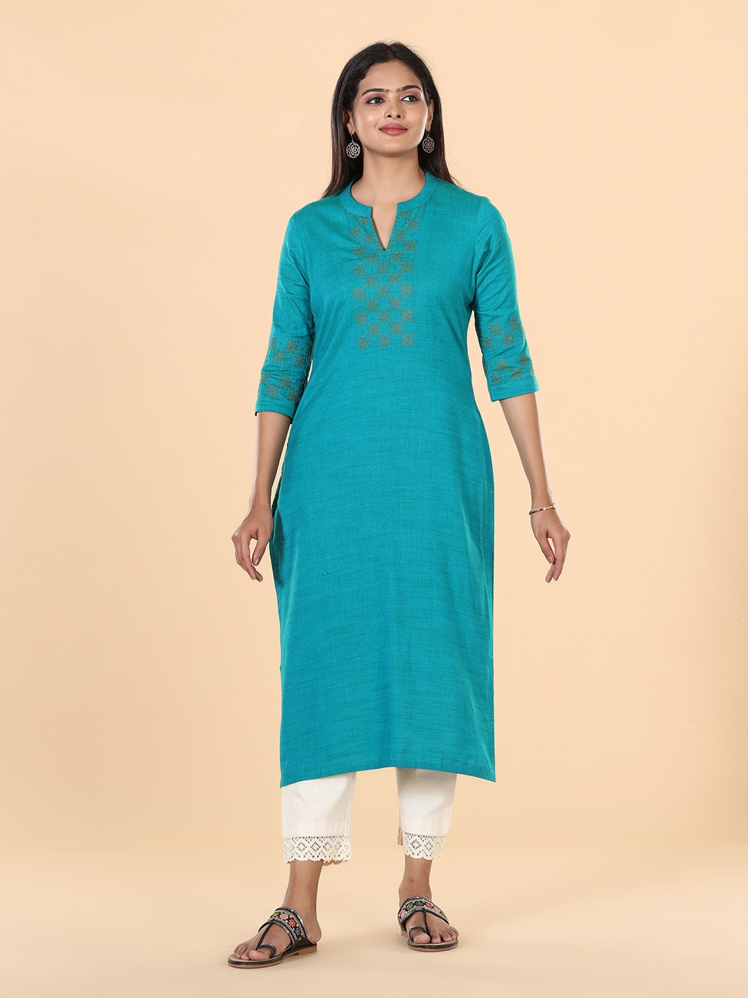 

Vismay Women Yoke Design Thread Work Kurta, Turquoise blue