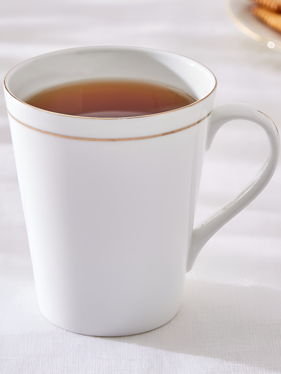 

Home Centre White Solid Bone China Glossy Mugs Set of Cups and Mugs