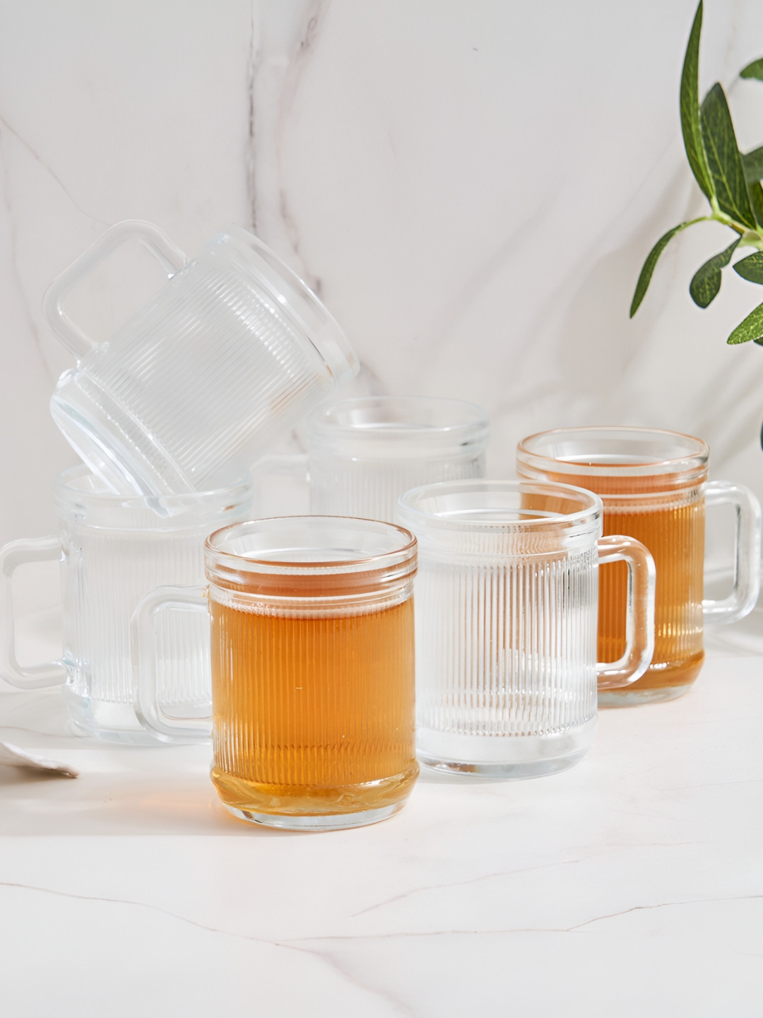 

Home Centre Transparent 6 Pieces Textured Glass Ribbed Mugs - 200ml