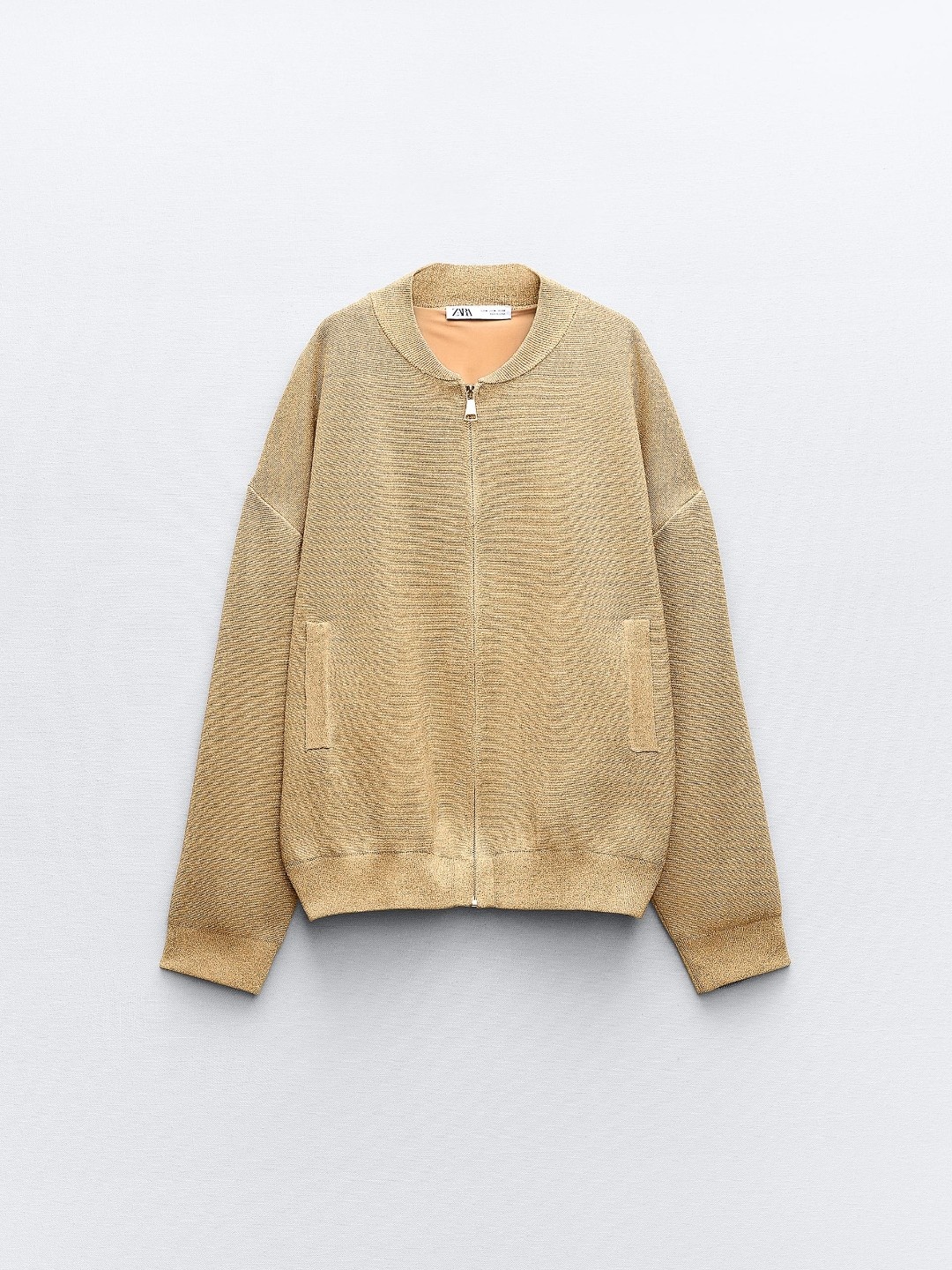 

ZARA Women Gold Coats