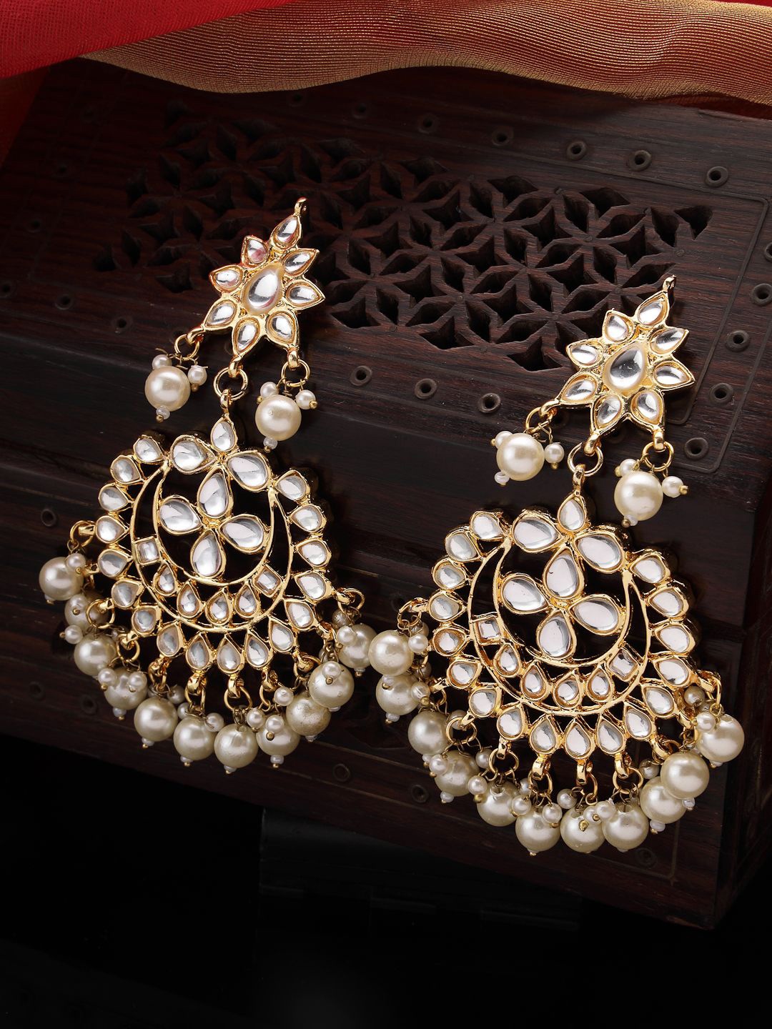 

NVR Gold Plated Kundan Studded Contemporary Chandbalis