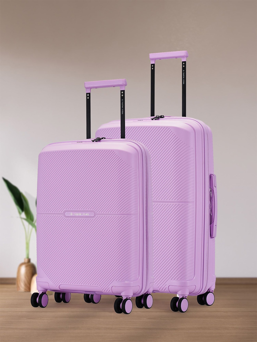 

Nasher Miles Hawaii Polypropylene TSA Lock Set of 2 S/M Purple Trolley Bags (55-65 cm)