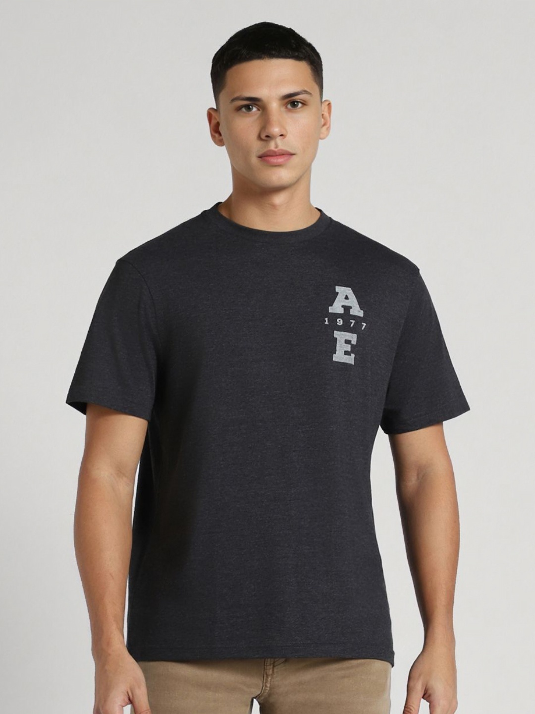 

AMERICAN EAGLE OUTFITTERS Men Solid Round Neck Cotton T-shirt, Grey