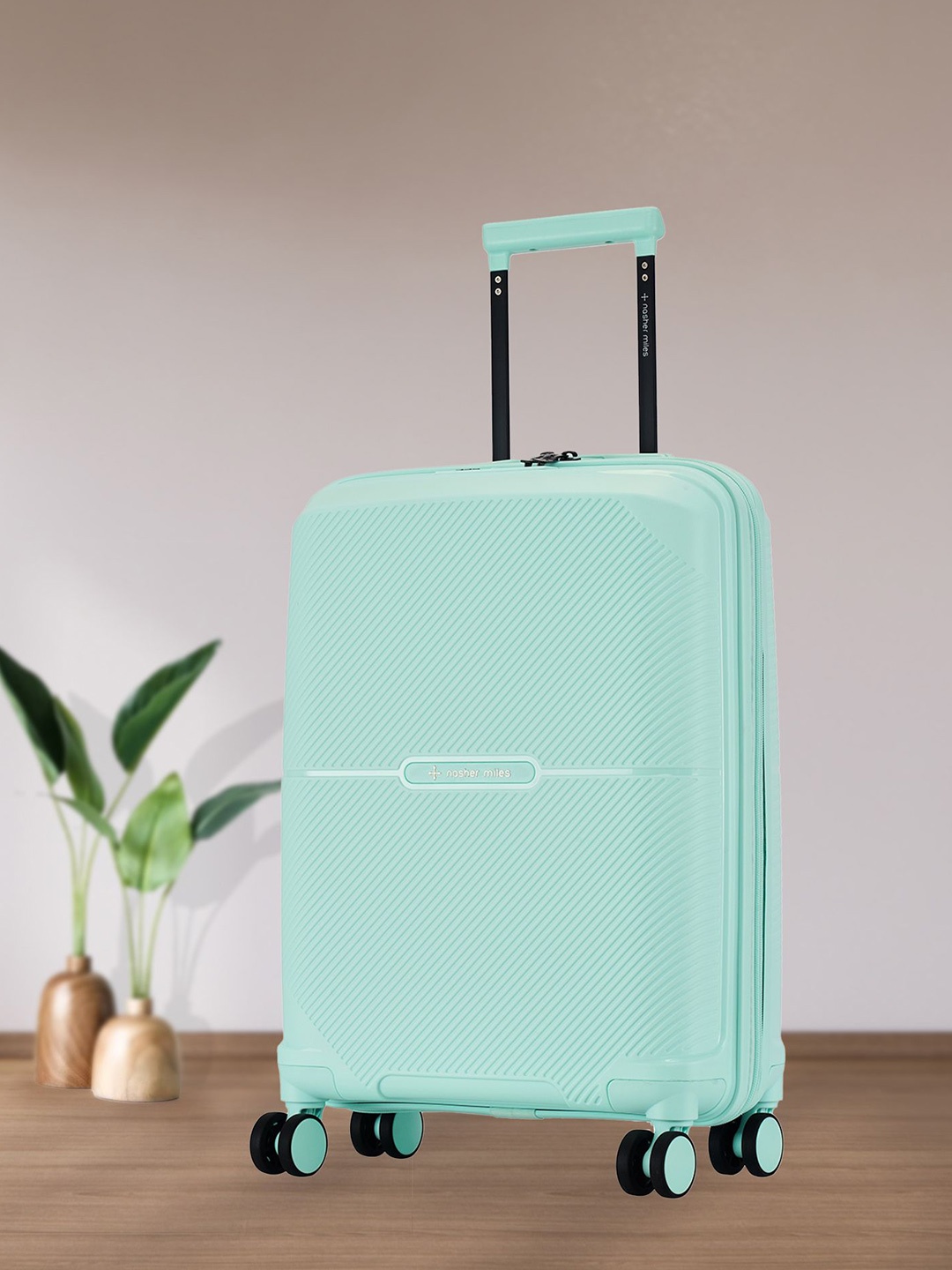 

Nasher Miles Hawaii Polypropylene TSA Lock Cabin Pastel Green Trolley Bag - 20 Inch (55cm)