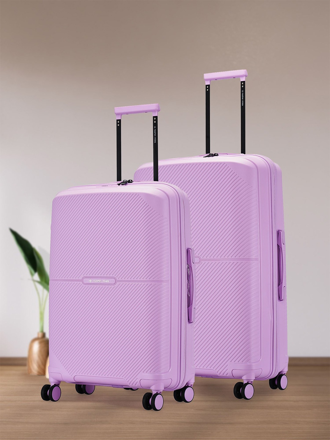 

Nasher Miles Hawaii Polypropylene TSA Lock Set of 2 M/L Purple Trolley Bags (65-75 cm)