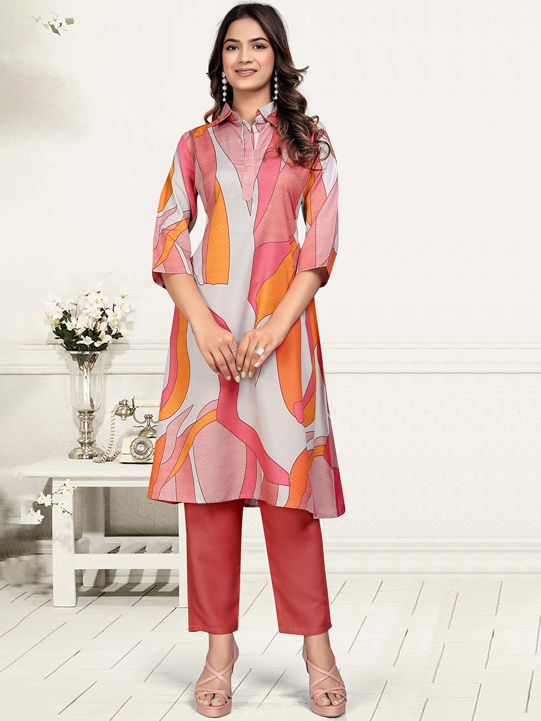 

APNISHA Geometric Printed Shirt Collar Regular A-Line Kurta with Trouser, Orange