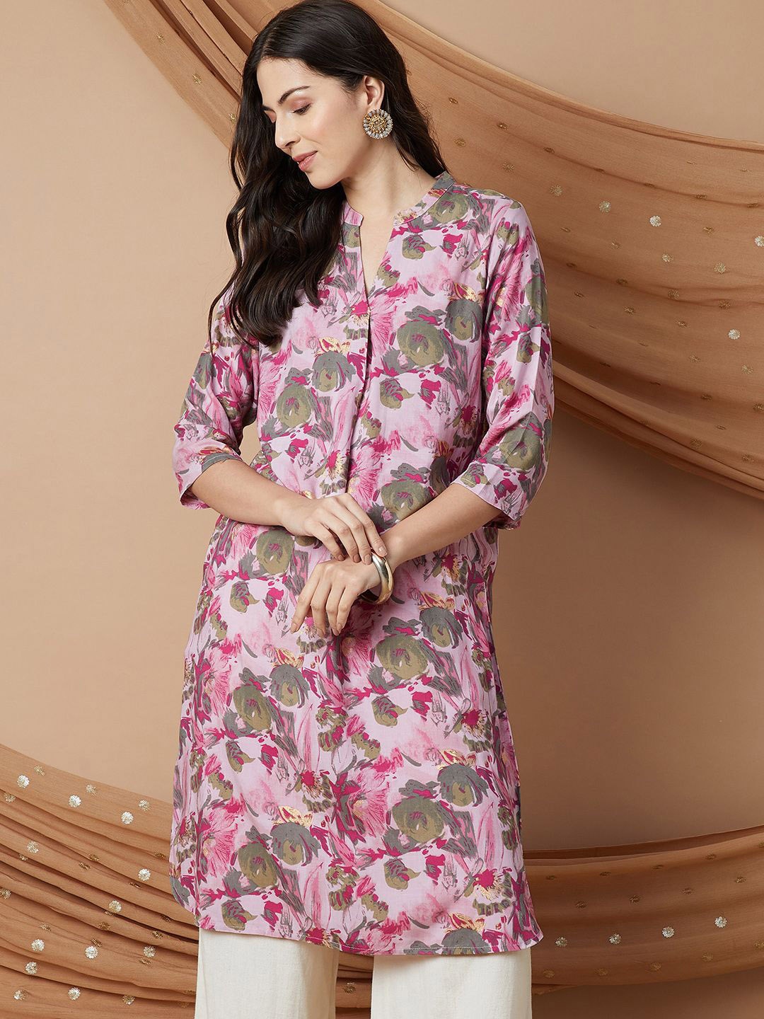 

Melange by Lifestyle Women Printed Flared Sleeves Kurta, Mauve