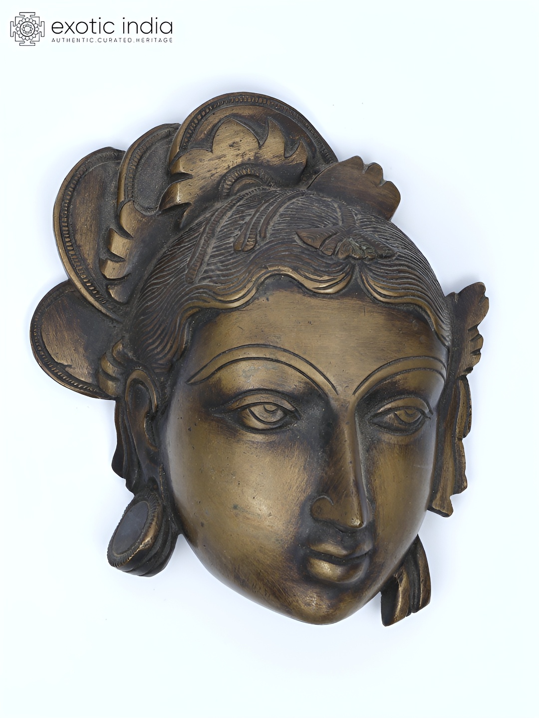 

Exotic India 5" Small Goddess Parvati Face Wall Hanging in Brass, Gold