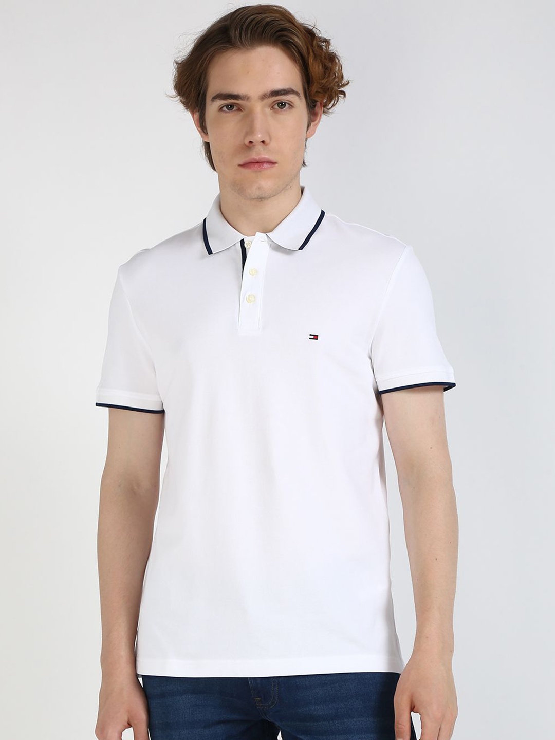 

Tommy Hilfiger Men Solid Polo Collar Cotton T-shirt, White