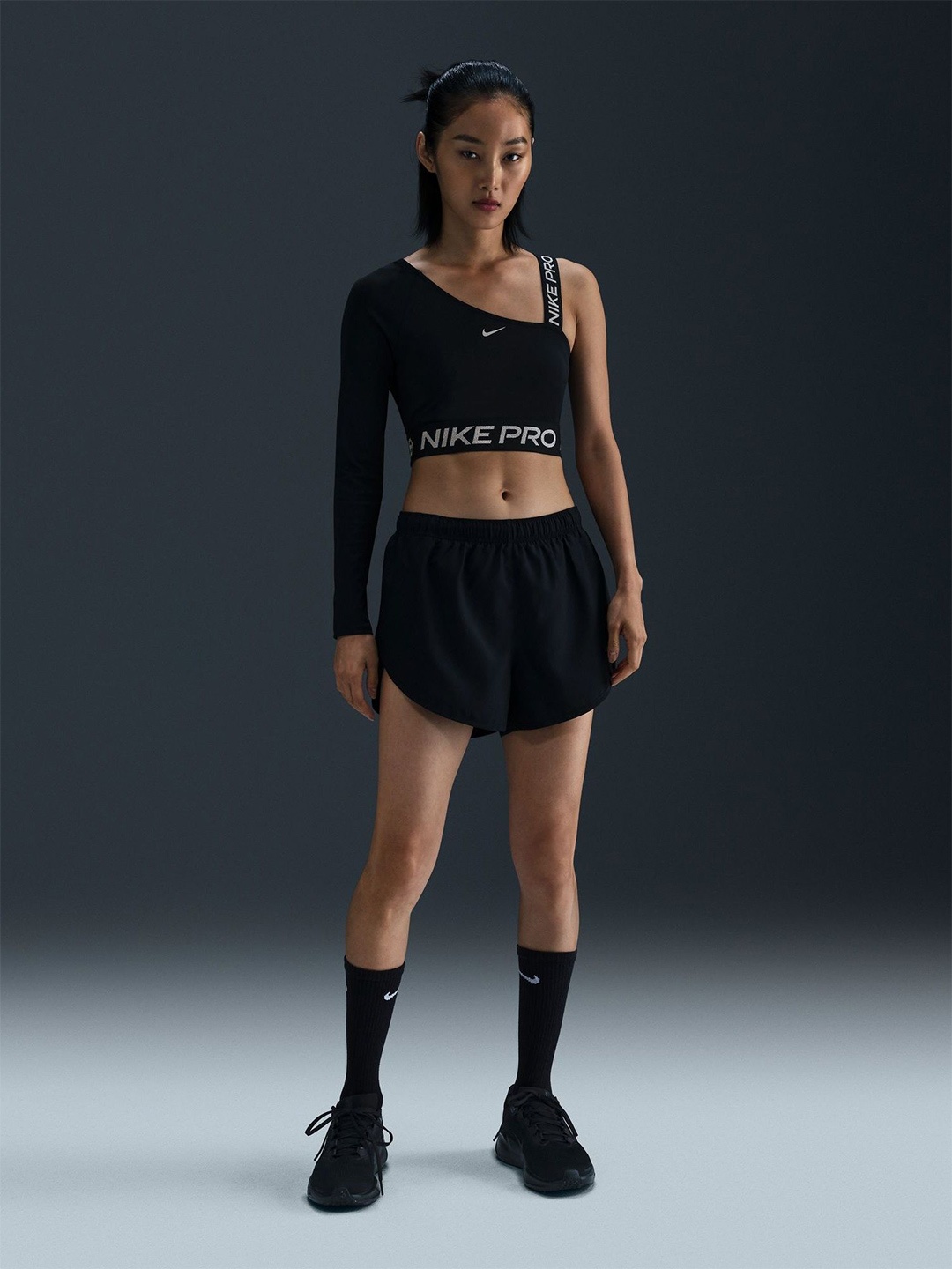 

Nike Pro Shine Women's Dri-FIT Asymmetrical Cropped Top, Black