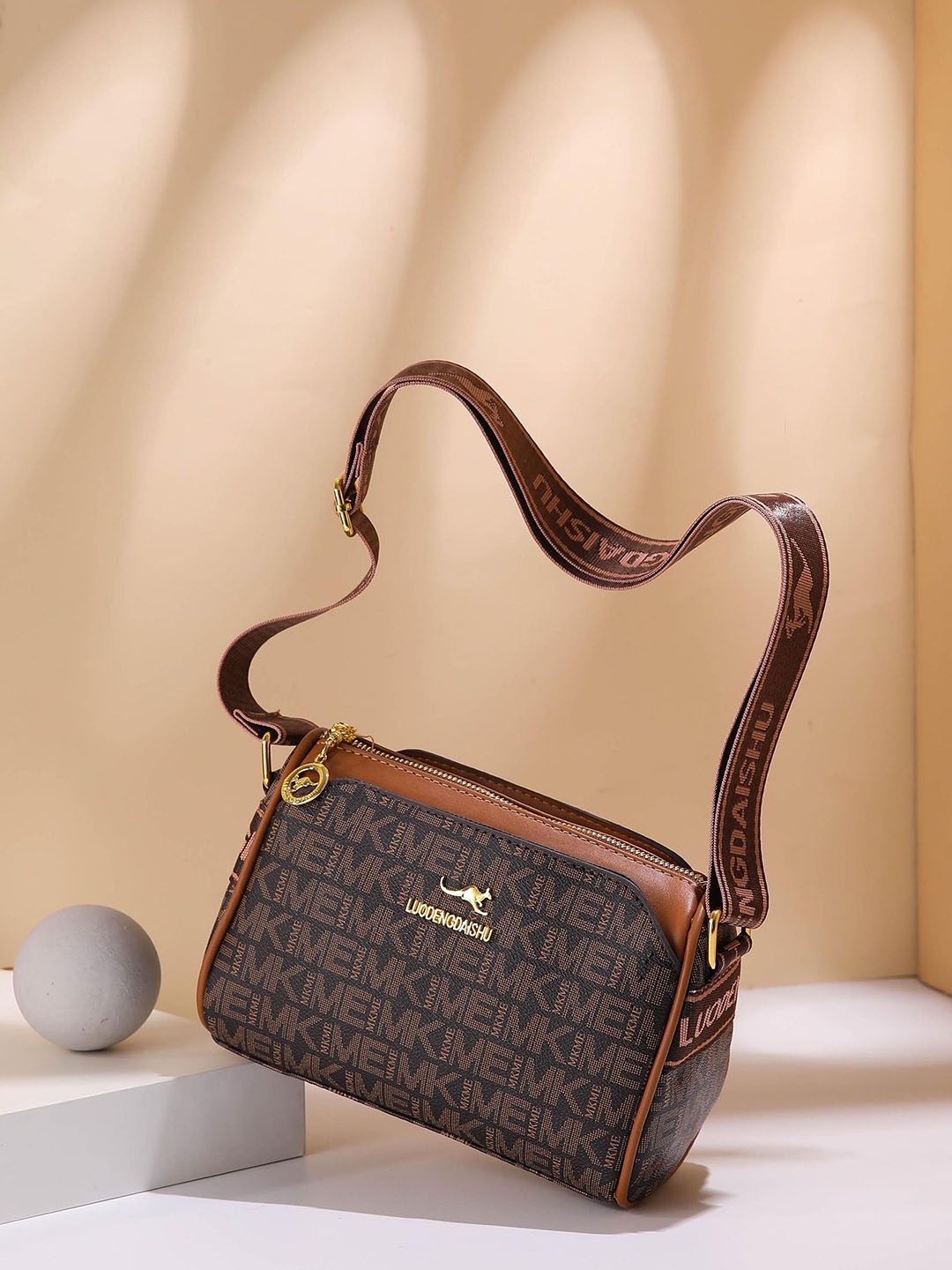 

Diva Dale PU Structured Sling Bag with Cut Work, Brown