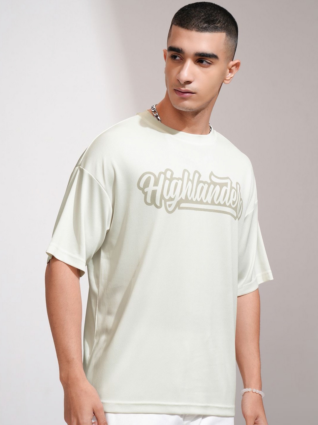 

HIGHLANDER Men Typography Printed Round Neck Oversized T-shirt, Off white