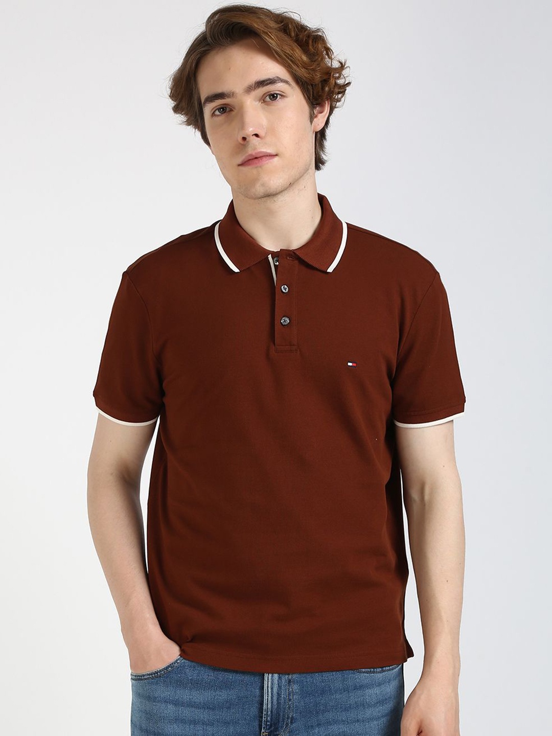 

Tommy Hilfiger Men Solid Polo Collar Cotton T-shirt, Brown