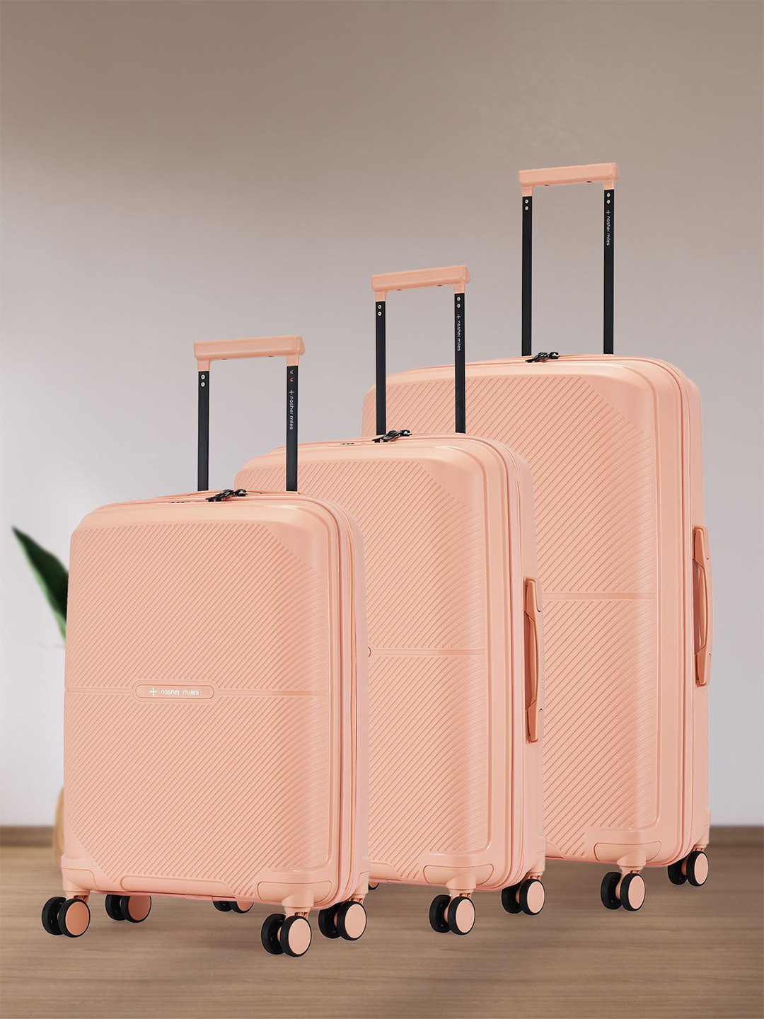 

Nasher Miles Hawaii Polypropylene TSA Lock Set of 3 S/M/L Peach Trolley Bags (55-65-75 cm)