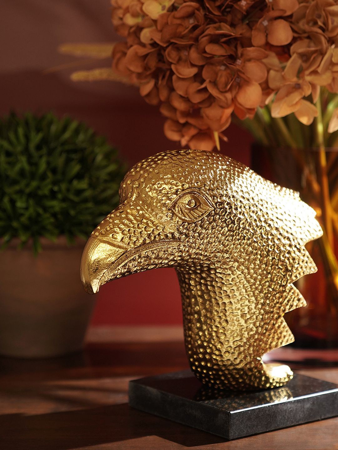 

Pure Home and Living Gold-Toned Figurine Showpiece