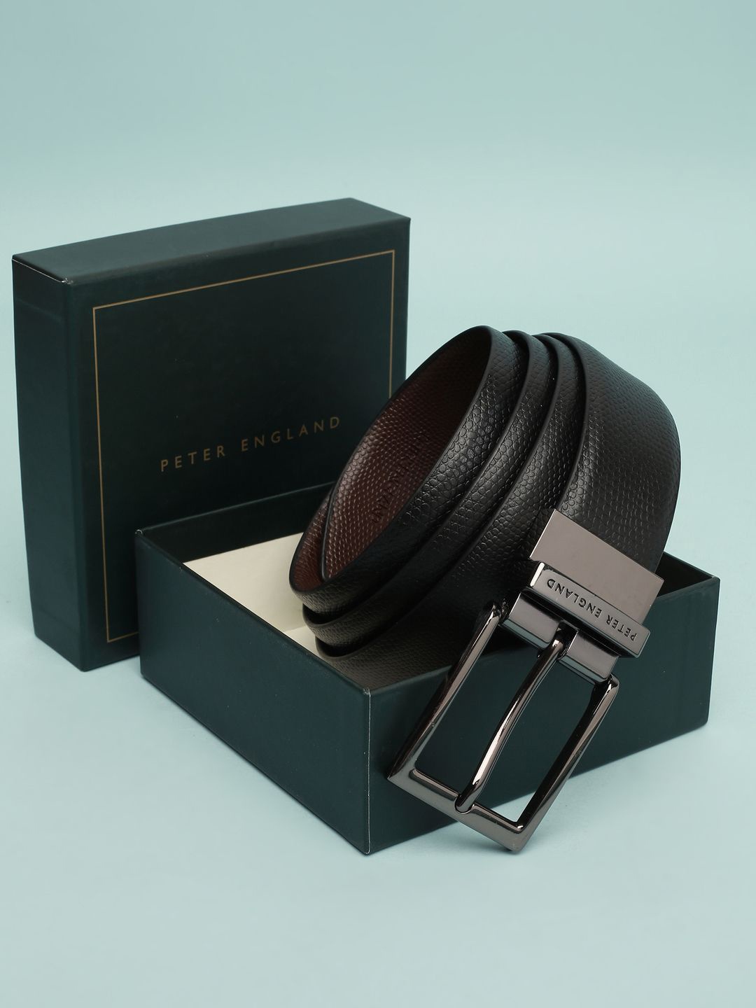 

Peter England Men Textured Leather Reversible Belt, Brown