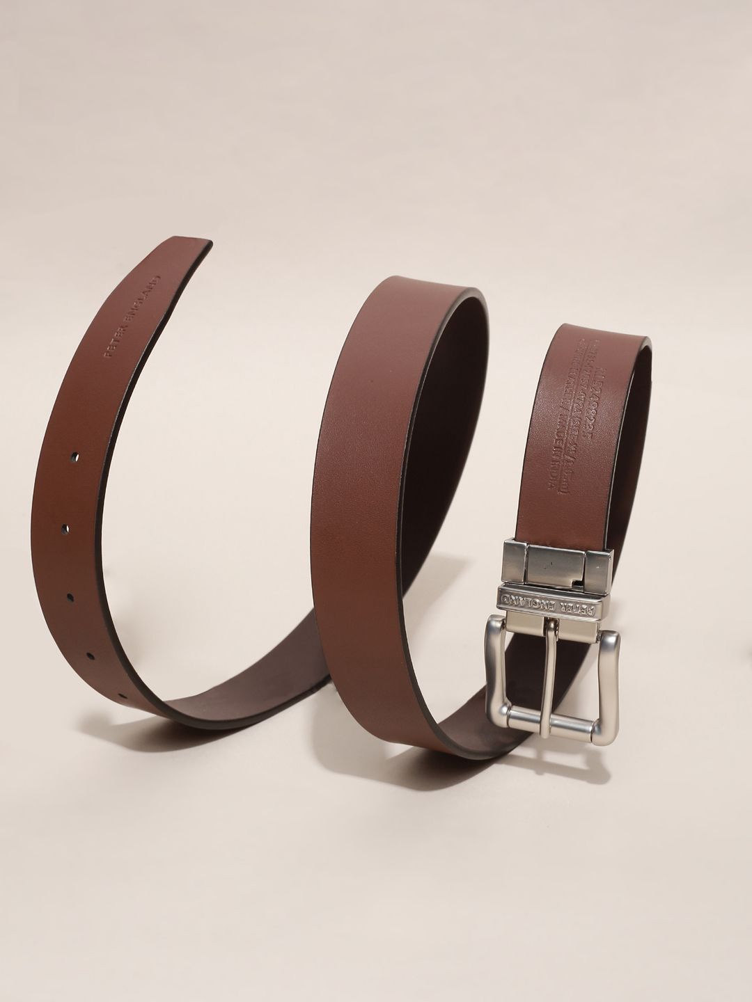 

Peter England Men Leather Reversible Formal Belt, Brown