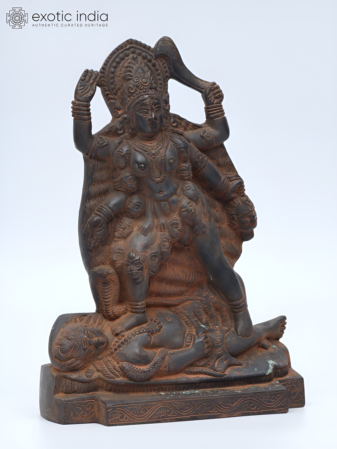 

Exotic India 9" Brass Goddess Kali Standing on Lord Shiva Statue, Brown