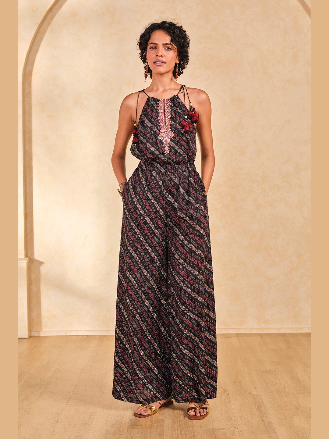 

Global Desi Women Sleeveless Halter Neck Printed Basic Jumpsuit, Black