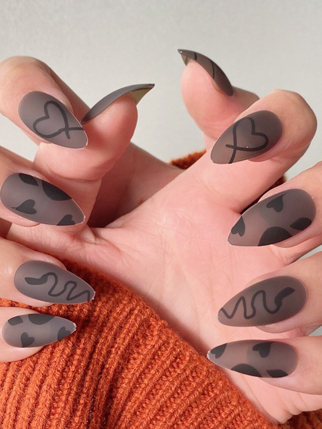 

Secret Lives Almond Black Heart Fake Nails