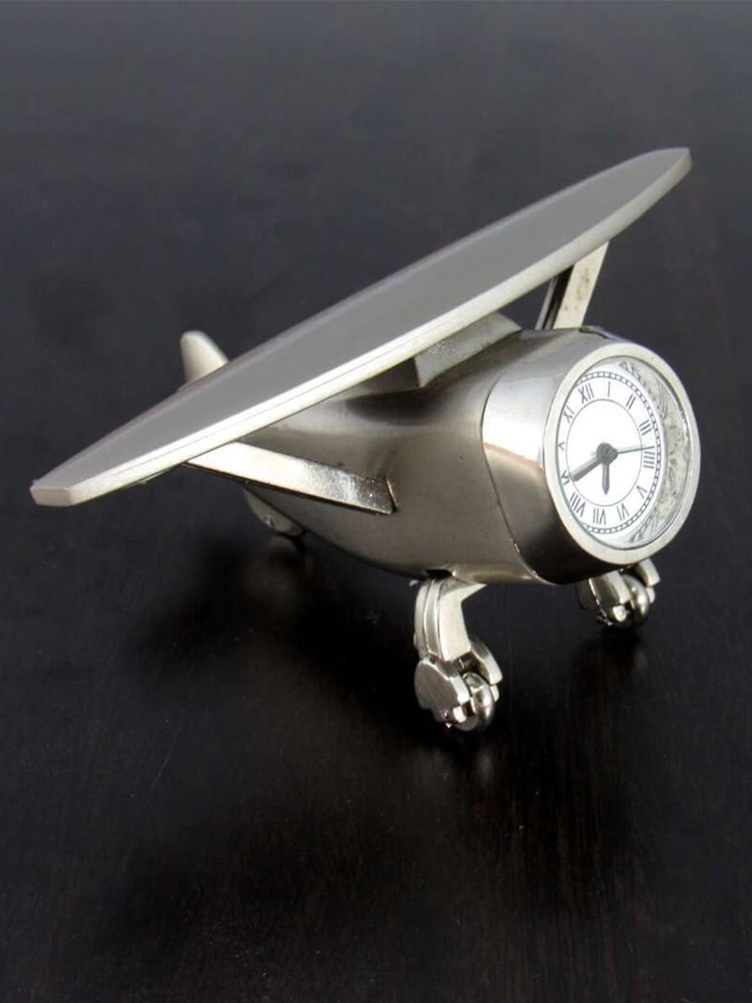 

Saugat Traders Silver Toned & White Aeroplane Shaped Curio Showpiece