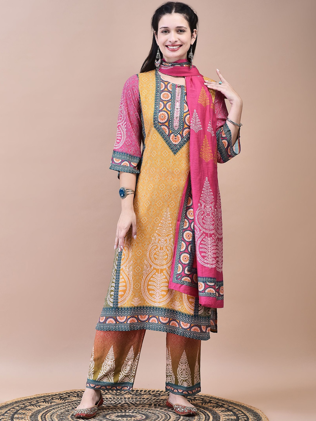 

Shree Bandhani Printed Keyhole Neck Regular Liva Kurta With Palazzo With Dupatta, Mustard