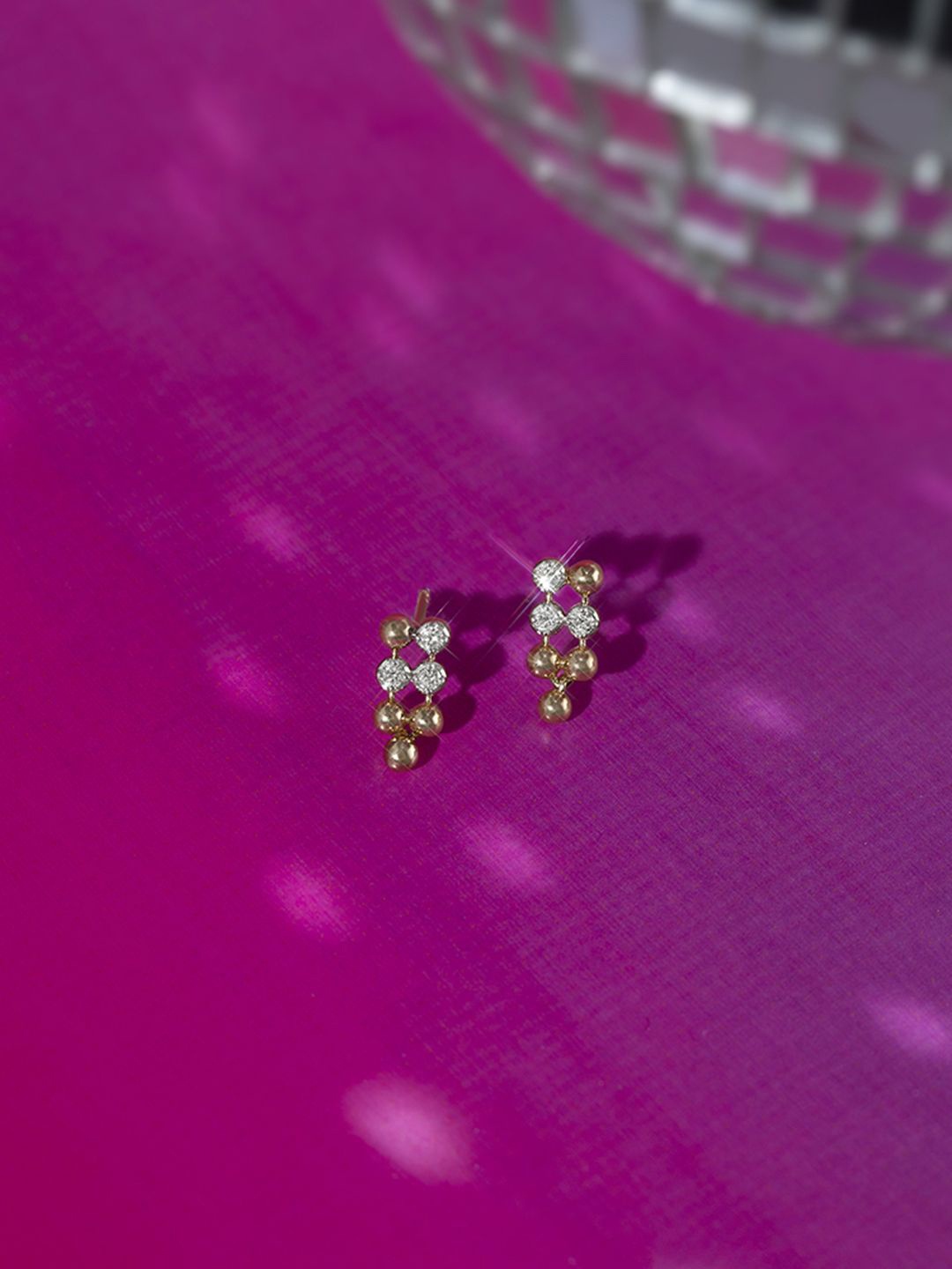 

Mia by Tanishq Women 14KT Diamond Stud Earrings, Yellow