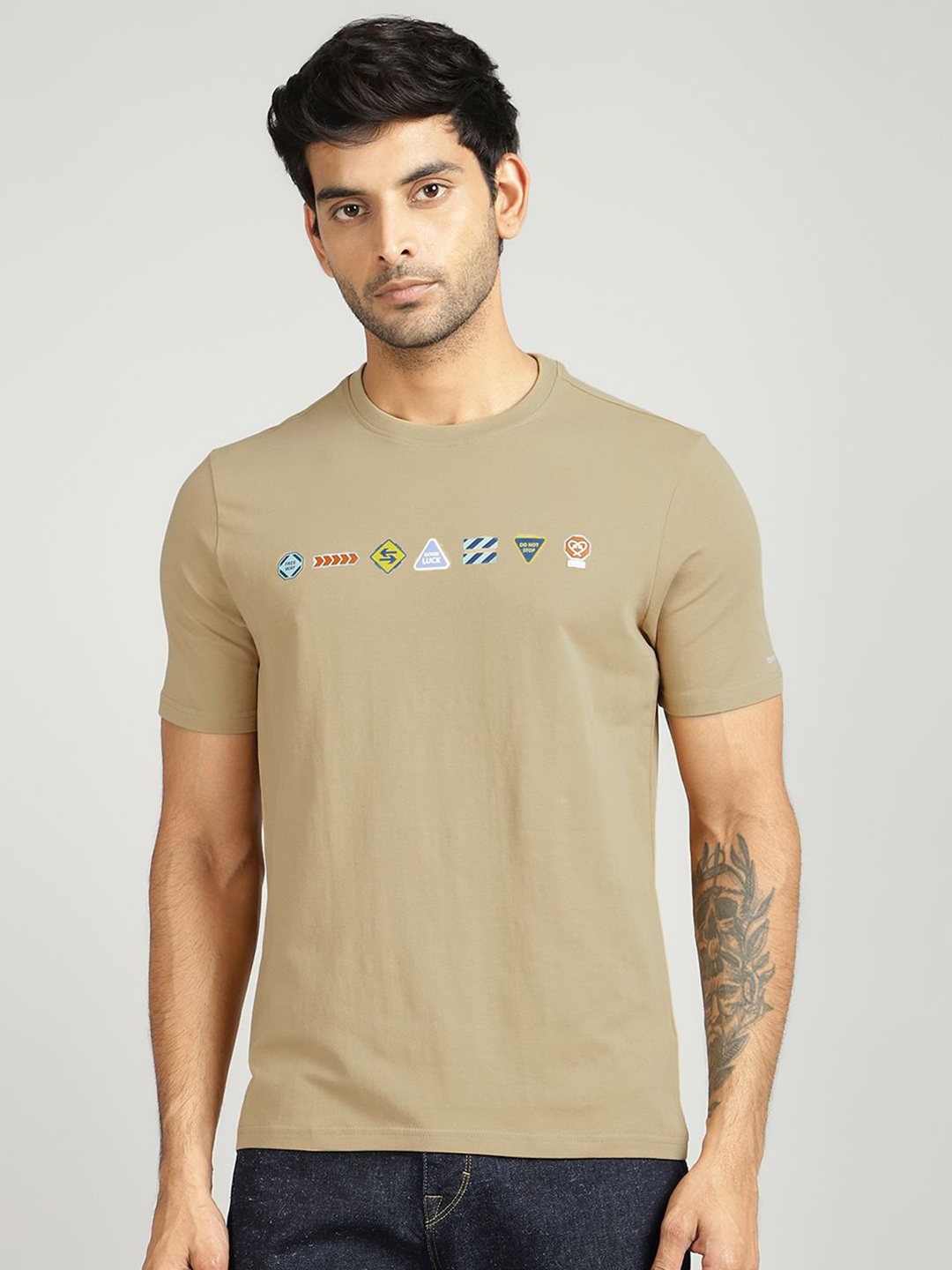 

Royal Enfield Men Solid Round Neck Cotton T-shirt, Brown