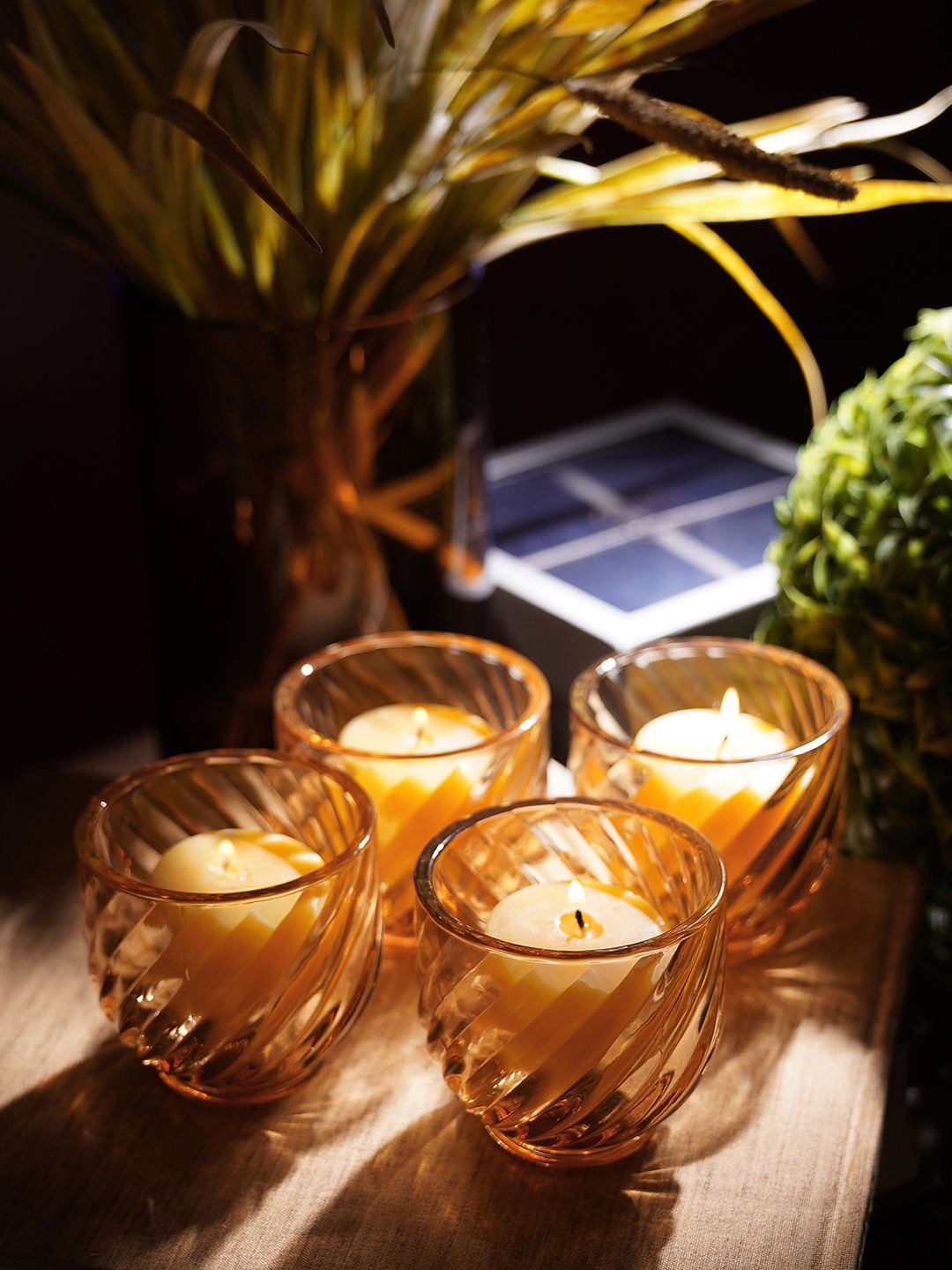 

Pure Home and Living Gold-Toned 4 Pieces Amber Swirl Glass Candle Holders