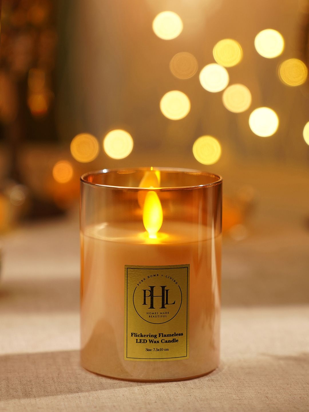 

Pure Home and Living Gold-Toned & White LED Flickering Flam Jar Candle