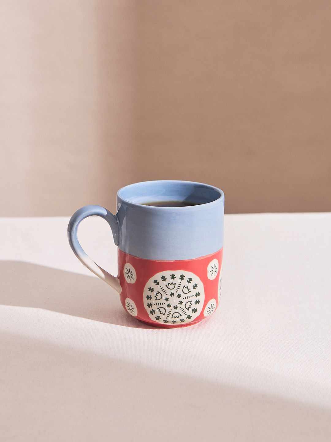 

Chumbak Red & Blue Printed Ceramic Glossy Mugs 300 ml
