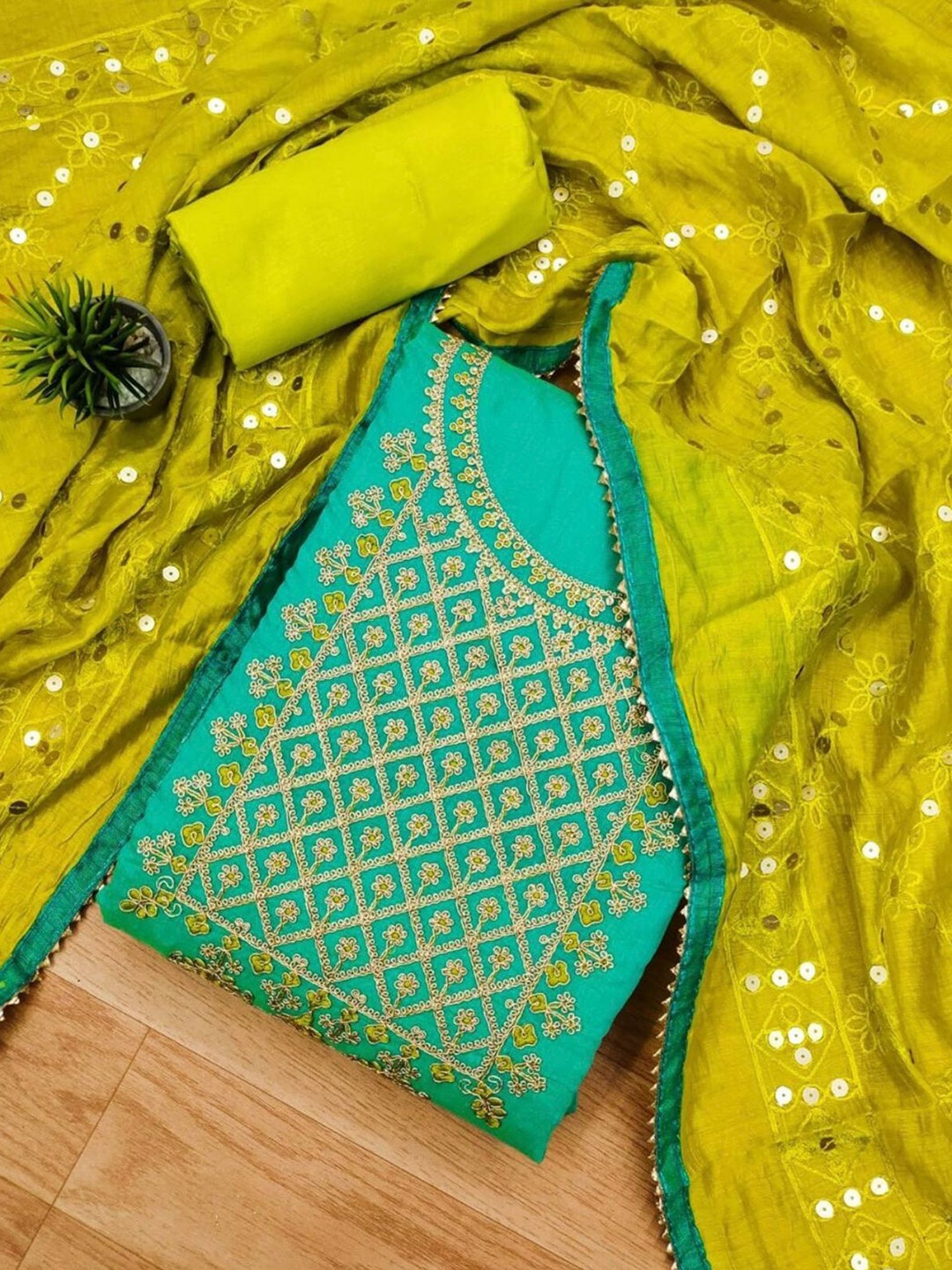 

Sidhidata Embroidered Yoke Design Sequined Unstitched Dress Material, Sea green