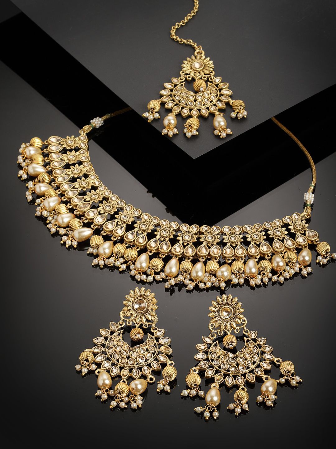 

Anouk Peach-Coloured Gold-Plated Kundan Stones-Studded & Pearls Beaded Jewellery Set