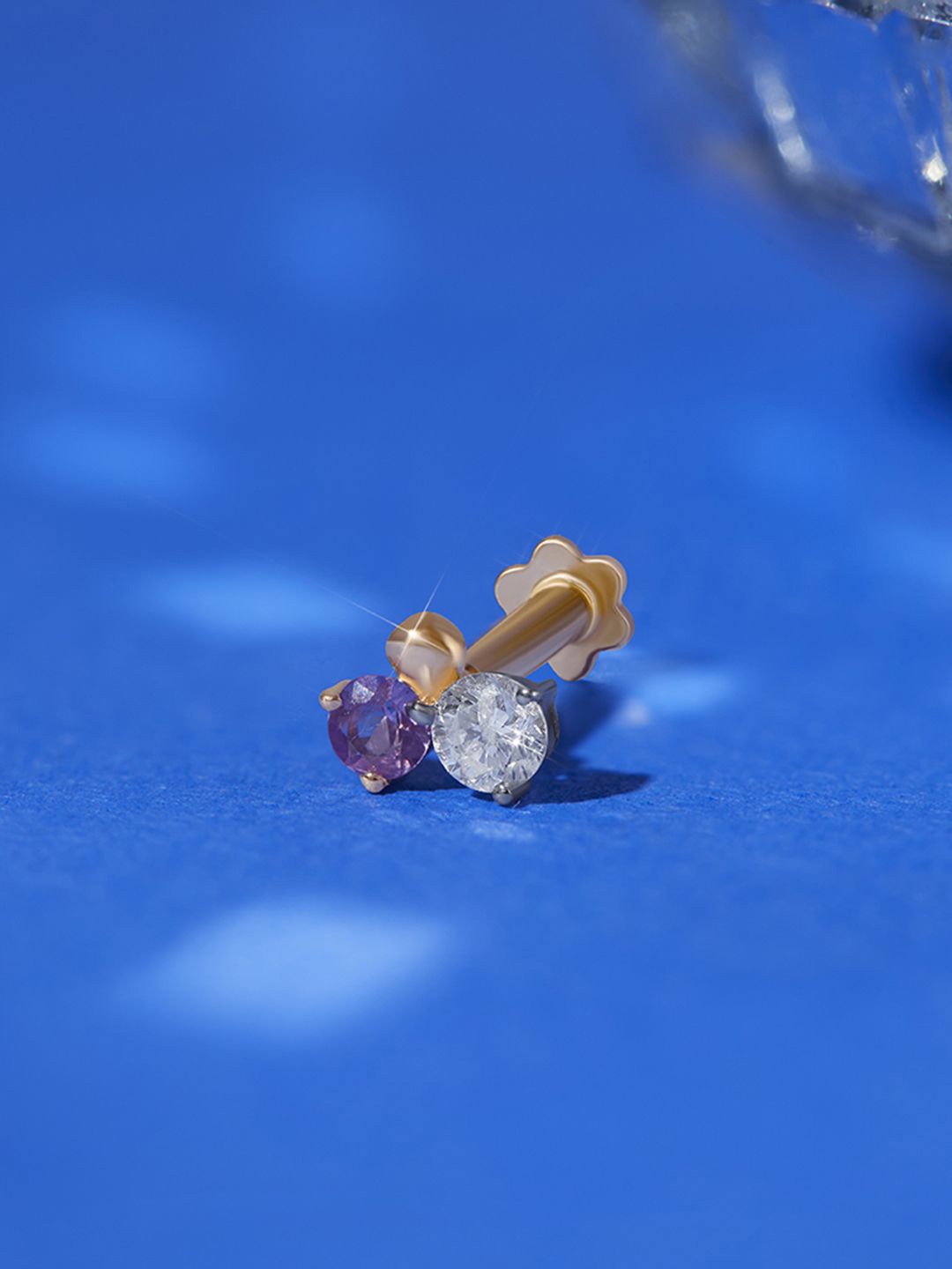 

Mia by Tanishq 14KT Rhythm Pulse Gold & Sapphire & Diamond Nose Pin - 0.23g, Yellow