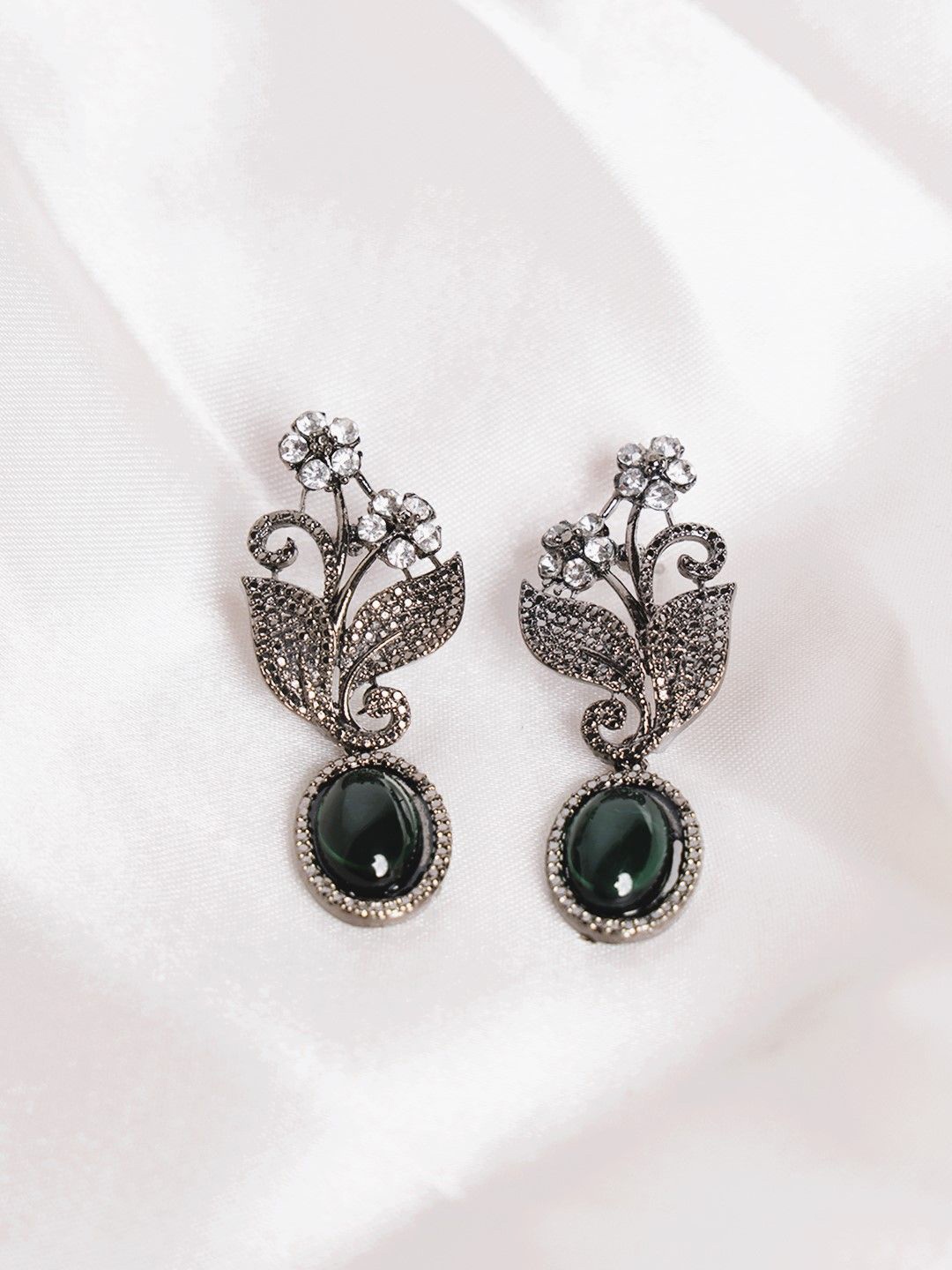 

PANASH Silver-Plated Cubic Zirconia Studded Leaf Shaped Oxidised Drop Earrings