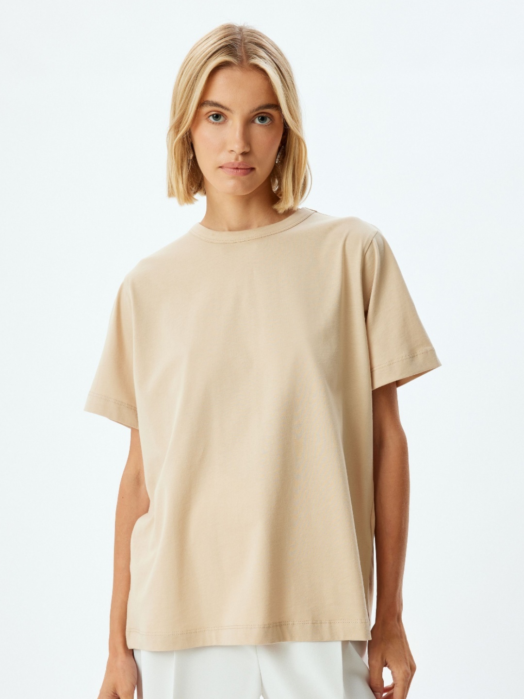 

Koton Women Solid Round Neck Cotton Relaxed Fit T-shirt, Beige