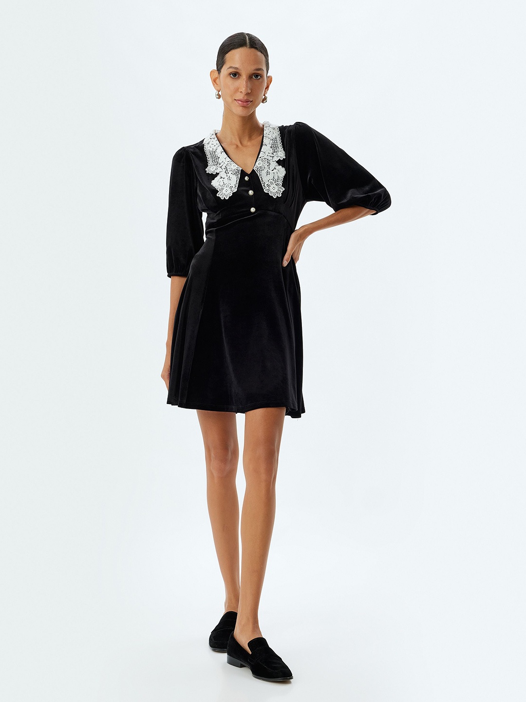 

Koton Women Solid A-Line Mini Dress, Black