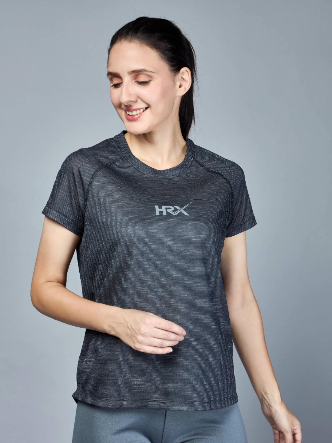 

HRX by Hrithik Roshan Women Solid Round Neck T-shirt, Grey
