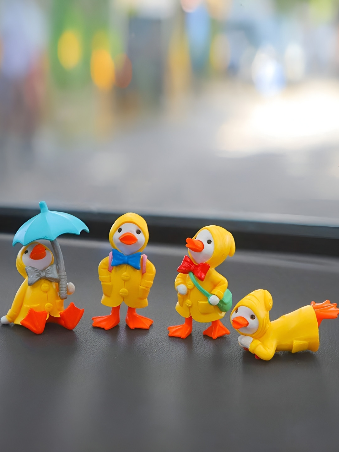 

Ascension Yellow & White 4 Pieces Cartoon Duck Miniature Showpieces