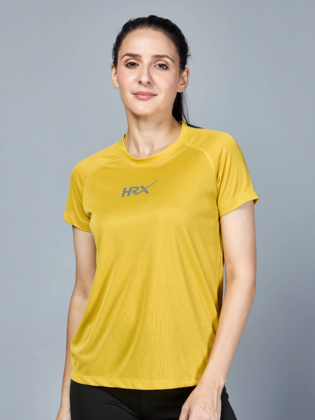 

HRX by Hrithik Roshan Women Solid Round Neck T-shirt, Yellow