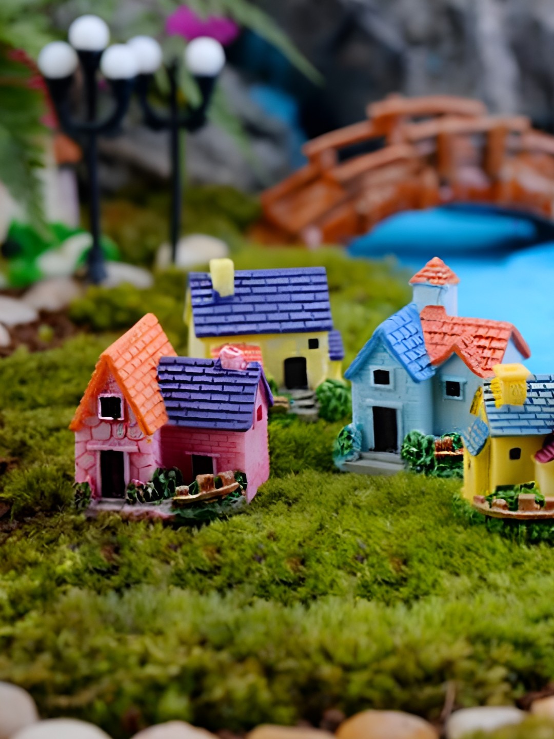 

Ascension Blue & Pink 4 Pieces Toy Cottages Miniature Showpieces
