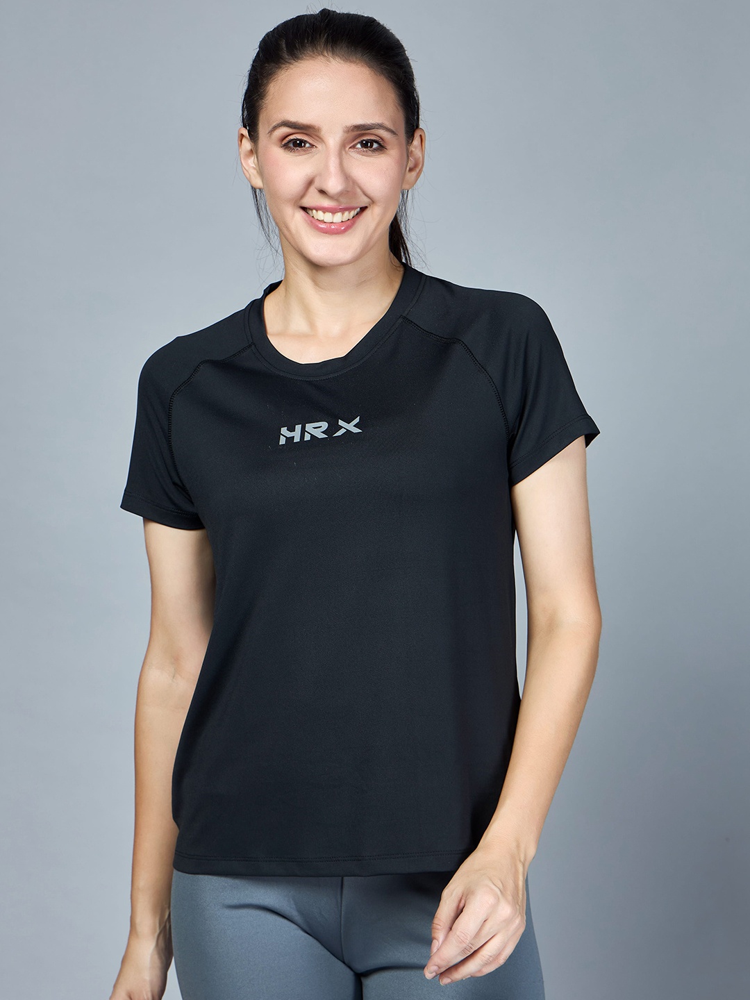 

HRX by Hrithik Roshan Women Solid Round Neck T-shirt, Black