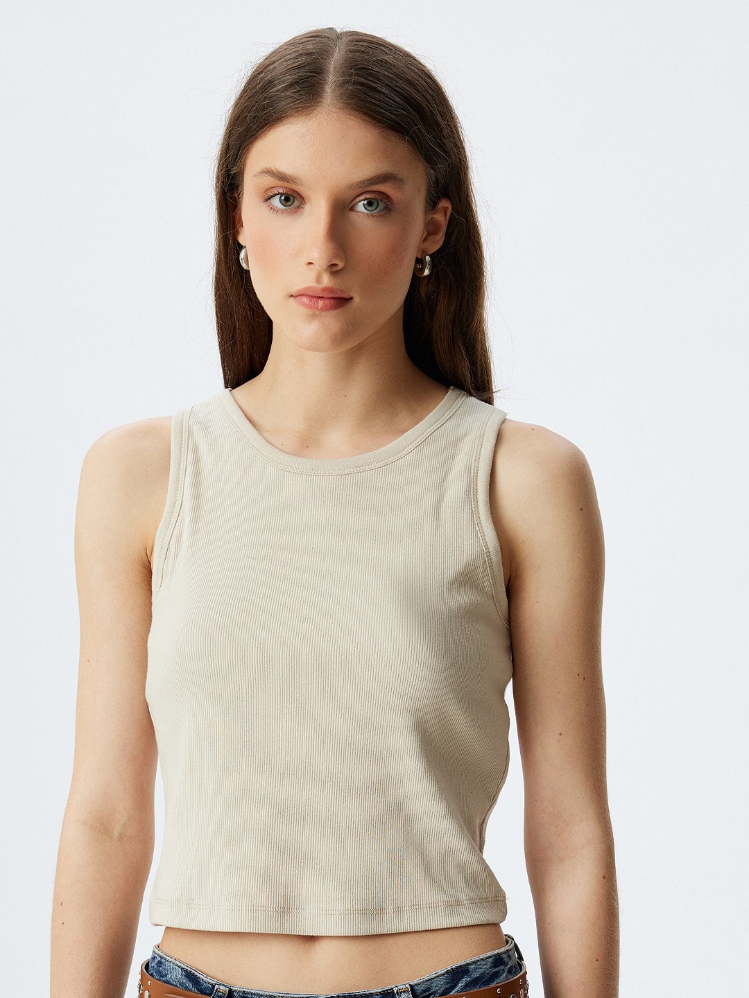 

Koton Women Solid Round Neck Cotton Top, Beige