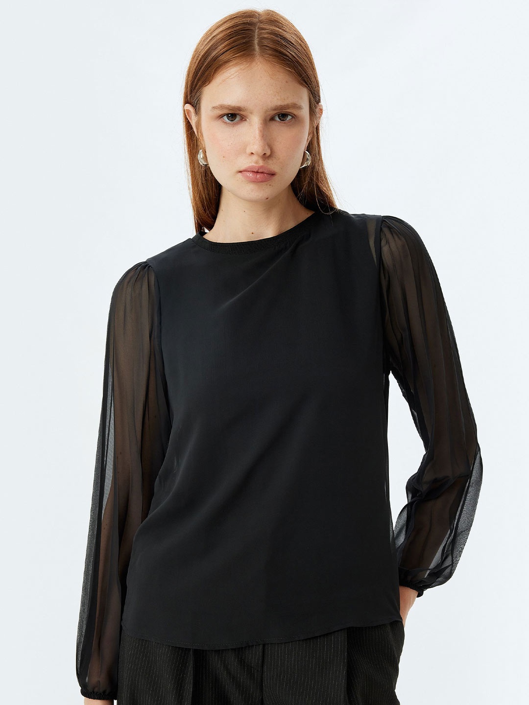 

Koton Women Solid Round Neck Top, Black
